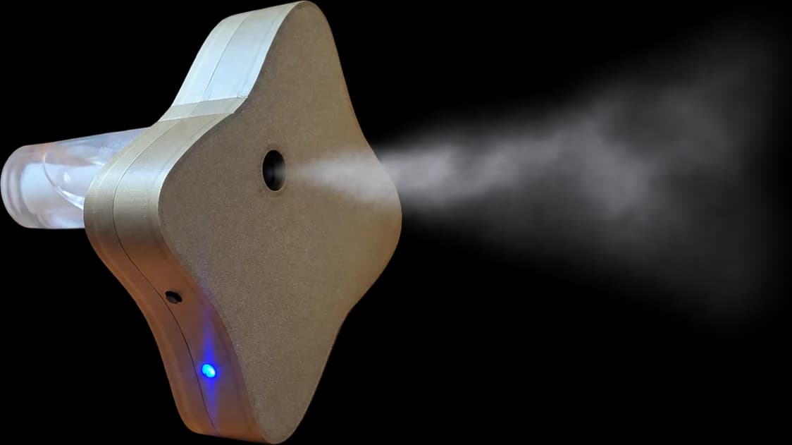 The Monarch atomizer releasing a cold plume of mist