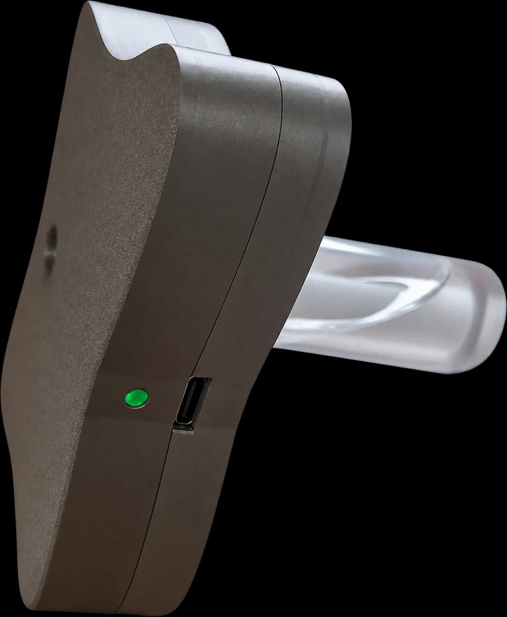 Side profile of the Monarch atomizer showing its USB-C port, status light and clear vial